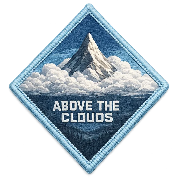 Above the Clouds patch — peak rising above cloud layer